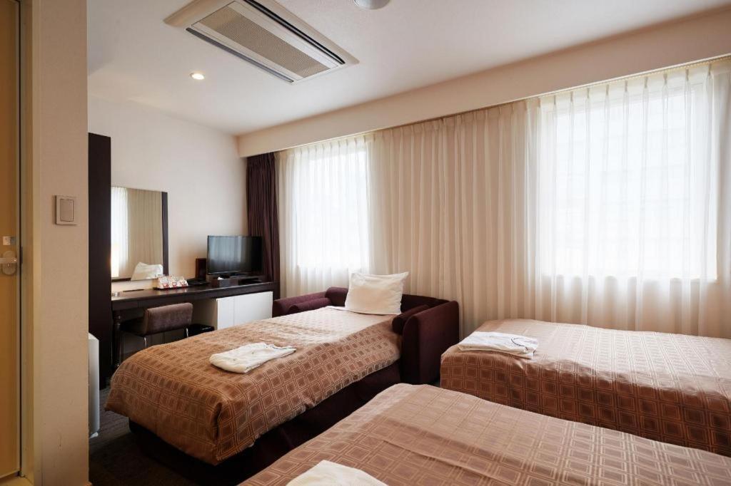 Hotel Yuquesta Asahibashi Naha Bagian luar foto